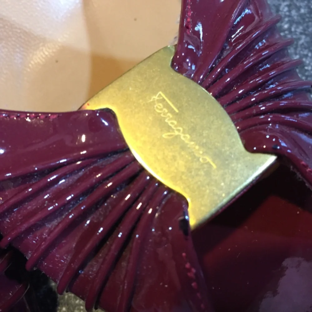 Salvatore Ferragamo Burgundy Patent Peep-Toe Heels with Gold Accent